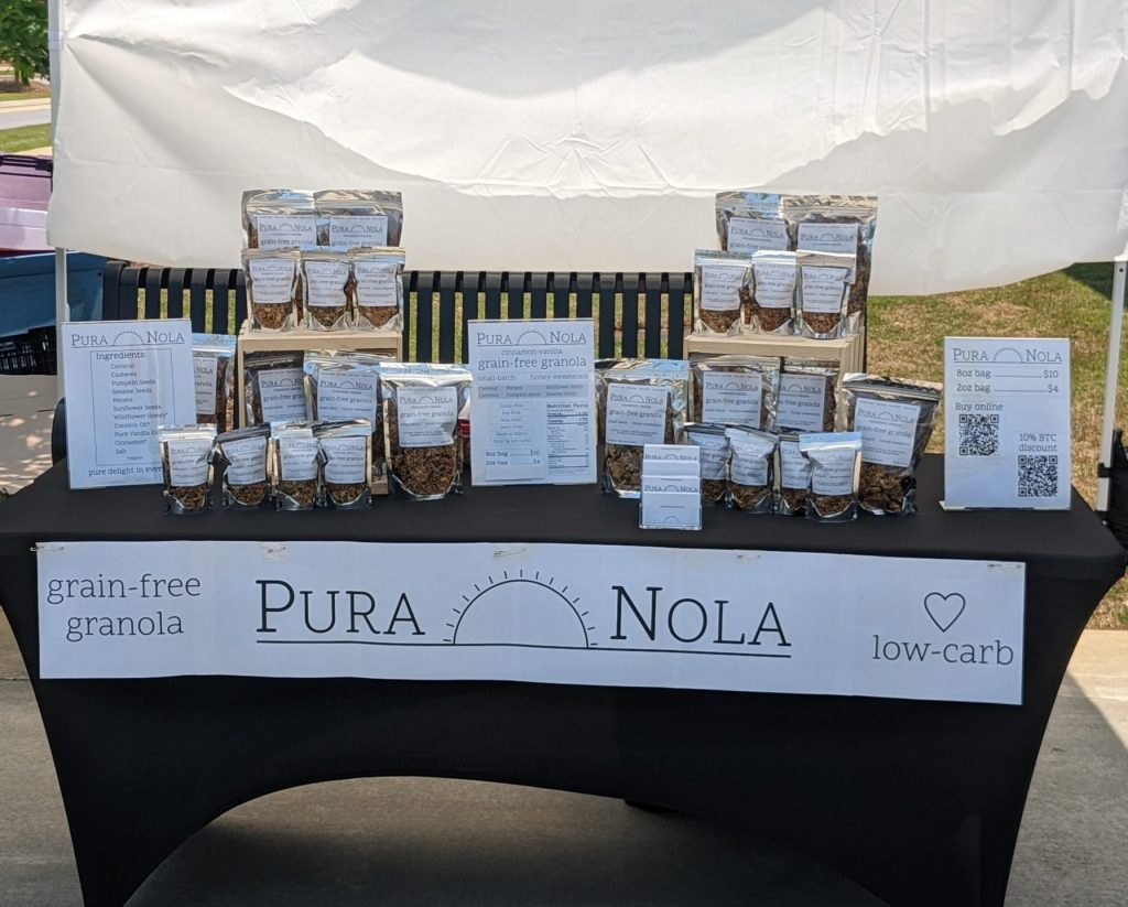 Pura Nola Stand